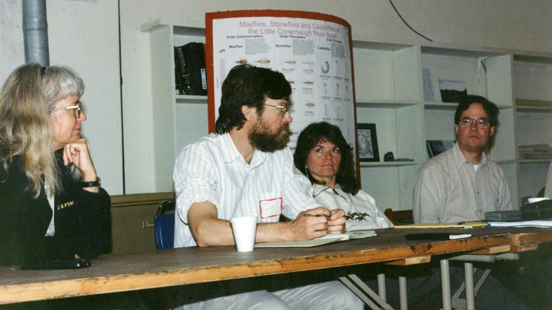 (From left) Marsha Wickle, Dan Inhoff, an unknown woman, and Mike Steinmaus at a meeting