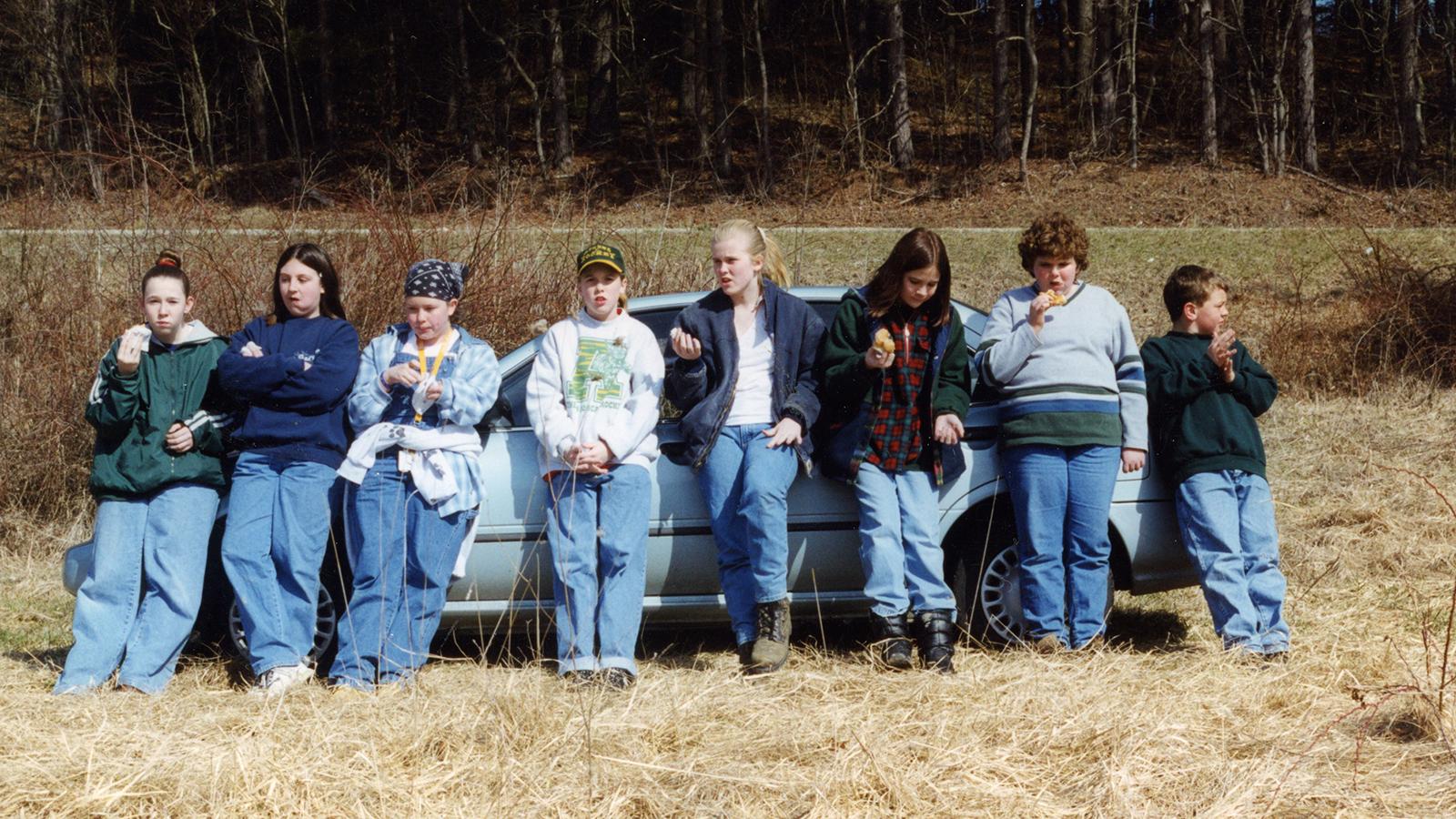 Volunteer tree-planters taking a break, North of Carbon Hill in Hocking County