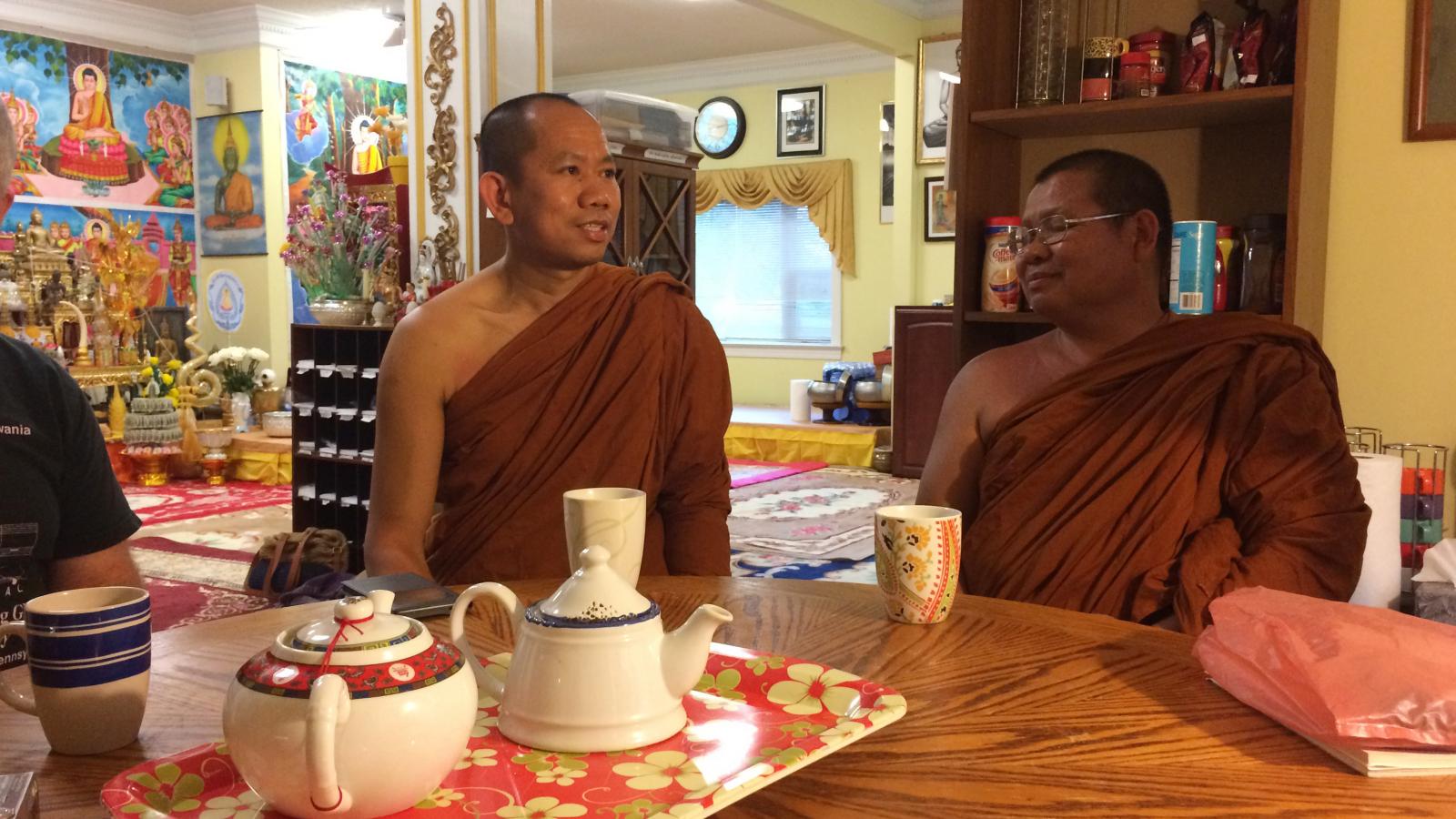 After the chanting and meditating session the house monks, Ajanh Sun Palee and Ajanh Thong Dee, have an opportunity to practice their English conversation skills over tea with guests. 