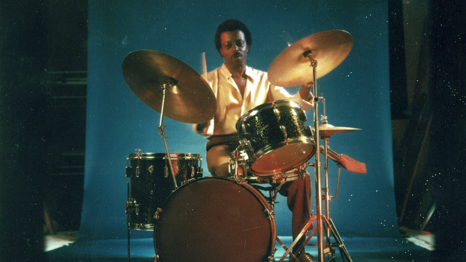 Young Philip Paul at drum set