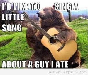 caption contest example showing bear with guitar captioned I'd like to sing a little song about a guy I ate