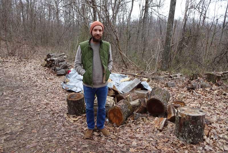 Ryan by woodpile Ryan by woodpile