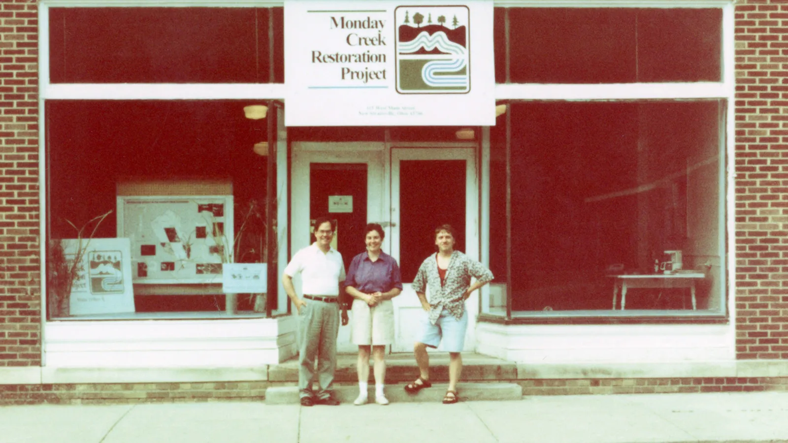 MCRP’s office opening. Pictured, from left: Mike Steinmaus, Norah Newberg, and Troy Mellott (an Americorps VISTA)