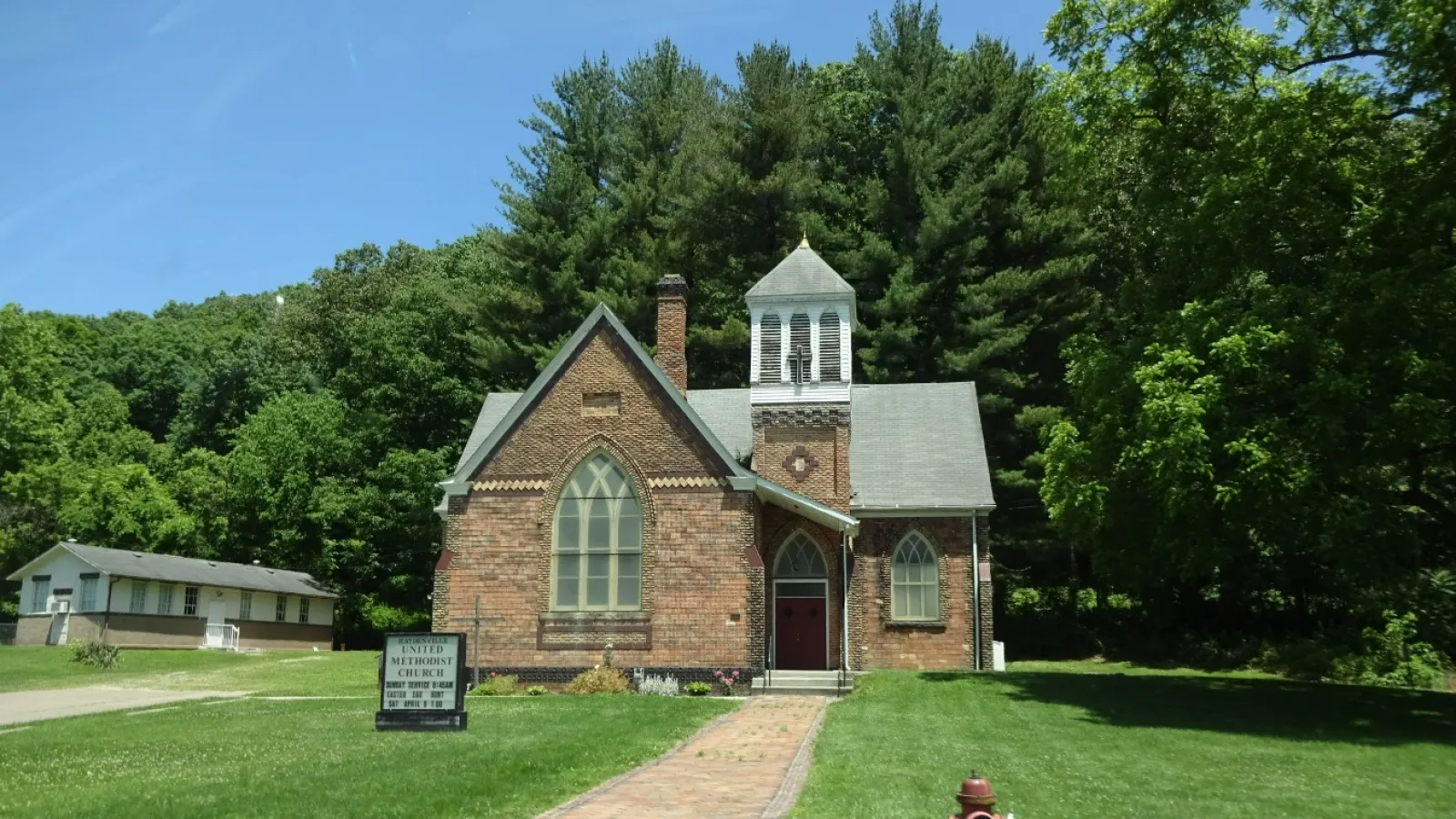 A small, brick Methodist church.