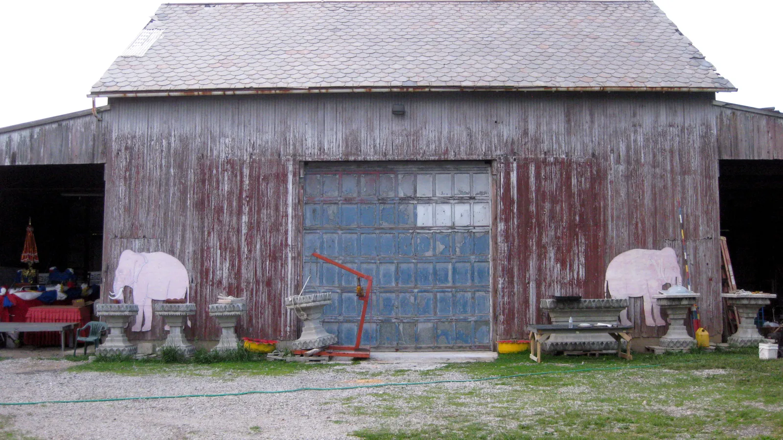 A barn on the property has been transformed into a temple housing a variety of gold Buddha statues from Thailand. 