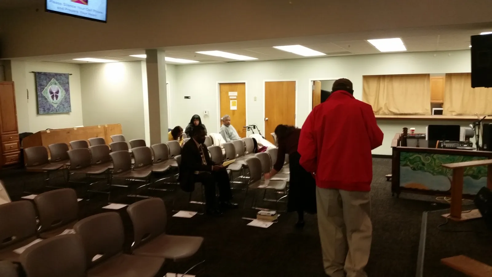 Waiting for service to begin at Church for All People