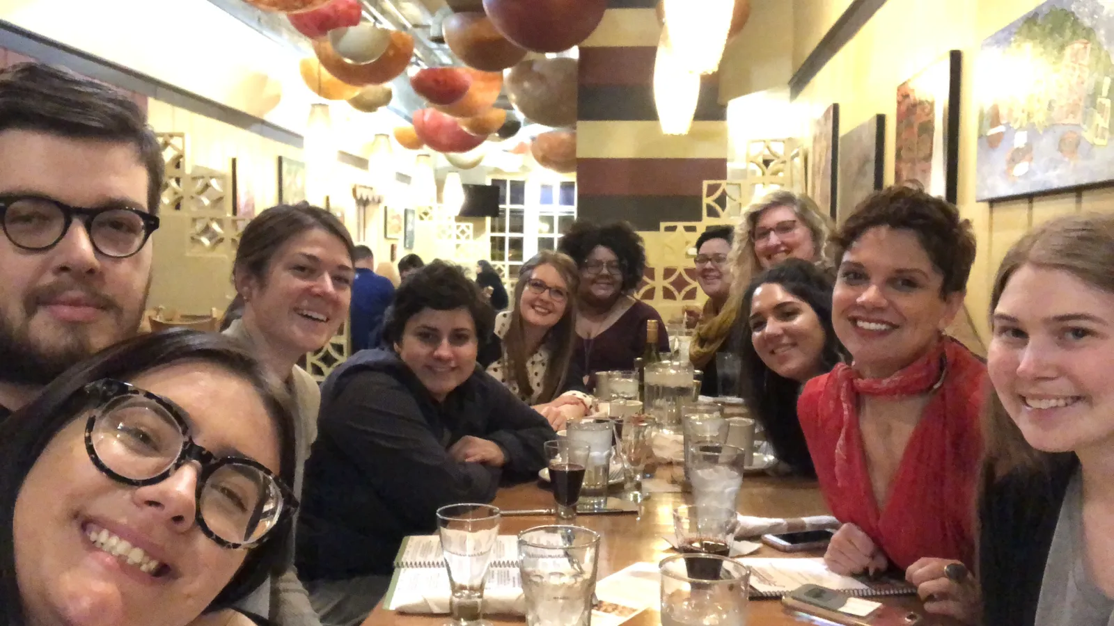 Crystal Good and students at dinner. The poet had dinner with several students at Aladdin's after her performance.