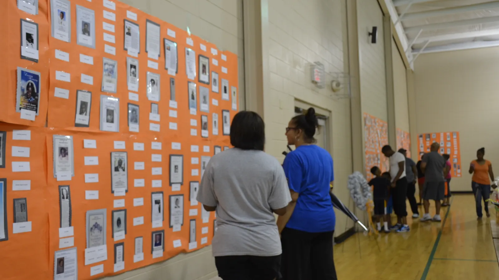 North End Super Reunion attendees visiting the Memorial Wall.