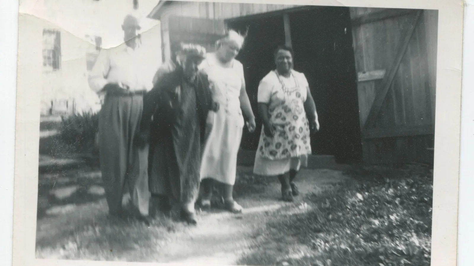 Group photo of John Luther Lewis, Anna Baker, Louise, and unknown