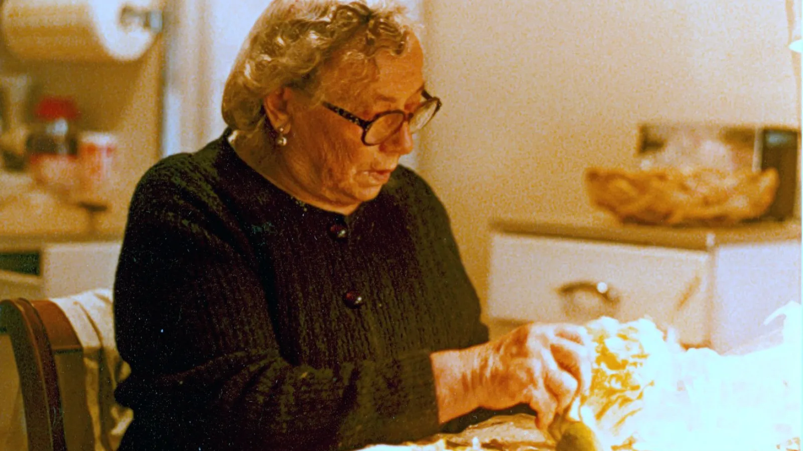 Mrs. Resnik prepares cabbage for chopping