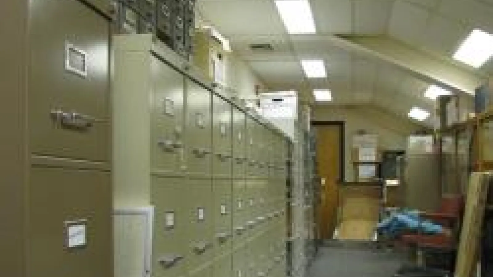 Filing cabinets in a long room