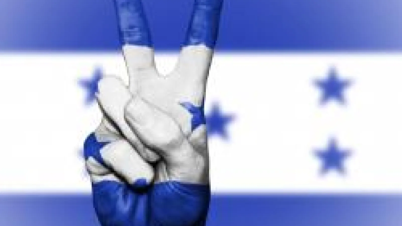 Honduran flag with a person's fist rising up 