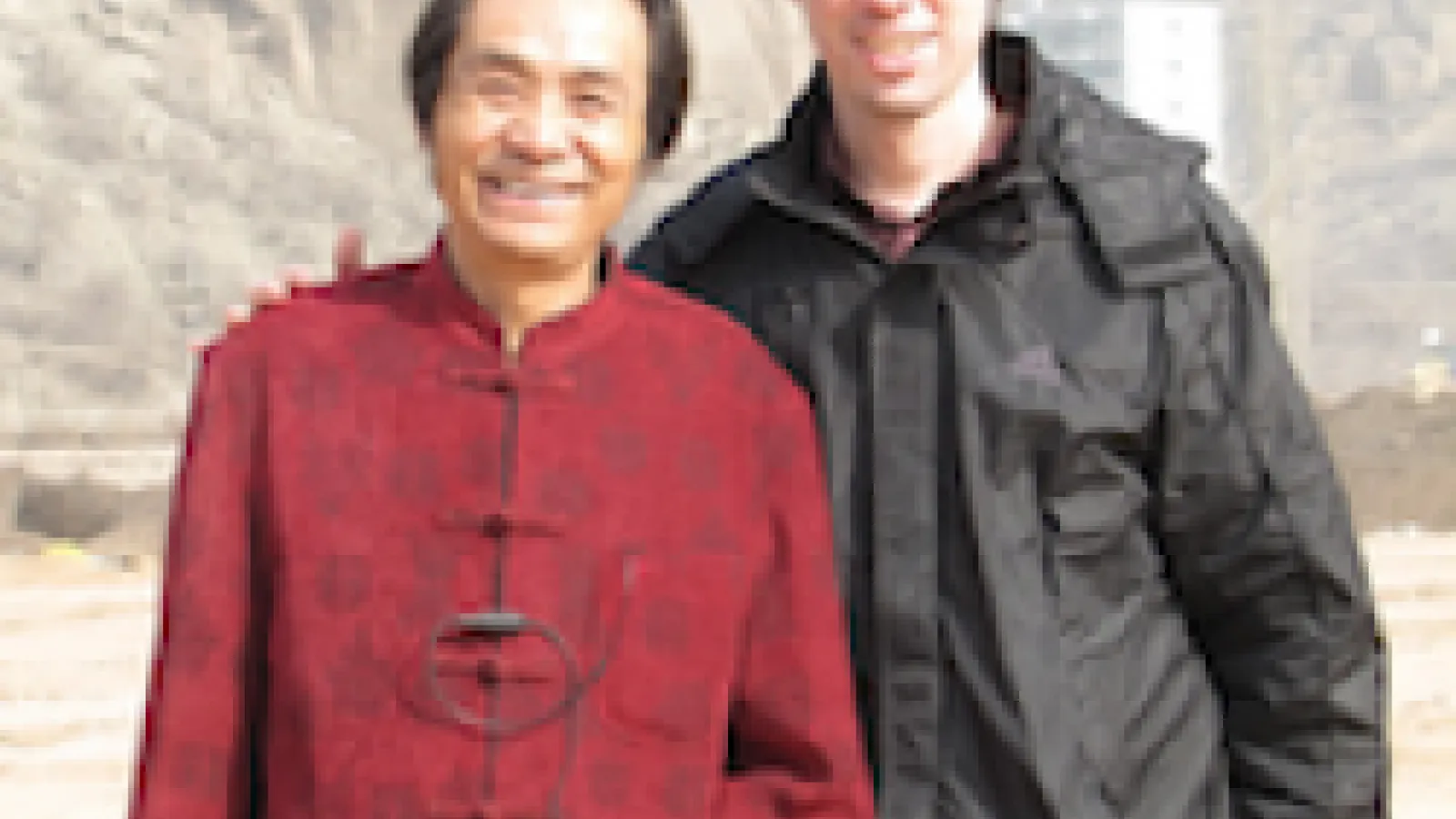 Levi Gibbs (right) standing with the King of Northern Shaanxi Folksongs, Wang Xiangrong (left)