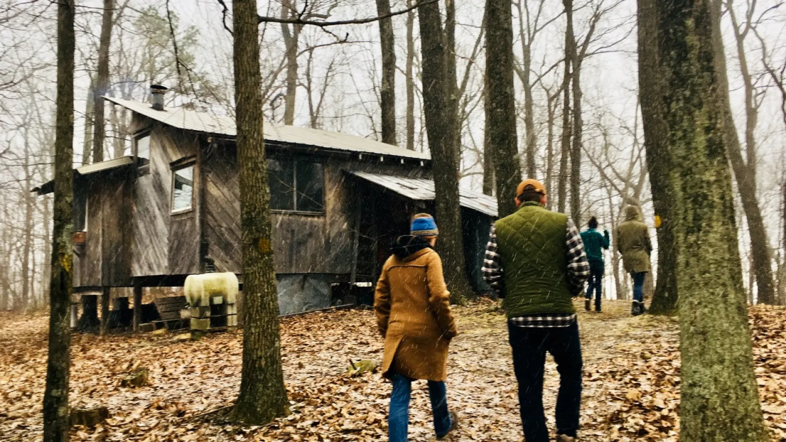 Molly Rideout (left) and Ryan Sprinkle (right) walking to Ryan and Kinsey Hall's cabin.