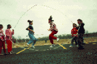 Girls jumping rope. Girls jumping rope.