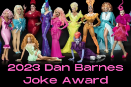 A group of colorful drag queens standing two on floor