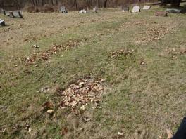 Depressions indicating unmarked graves