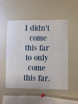 Piece of paper that reads: "I didn't come this far to only come this far."