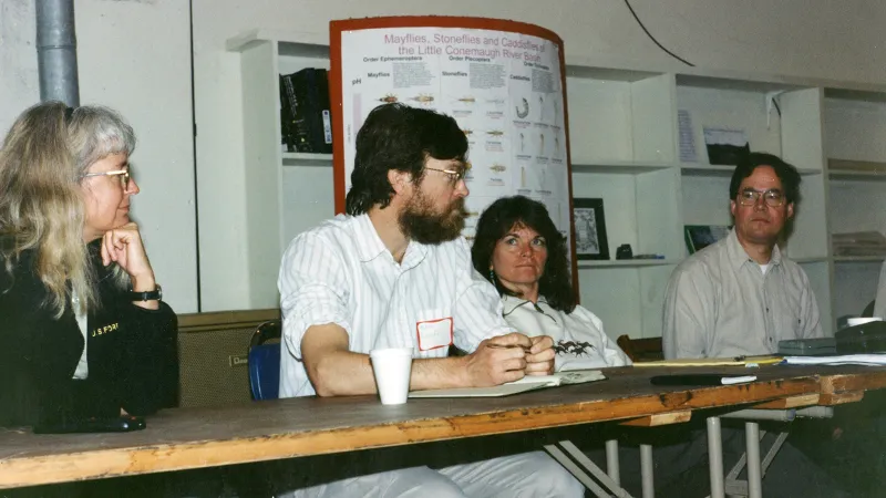 (From left) Marsha Wickle, Dan Inhoff, an unknown woman, and Mike Steinmaus at a meeting