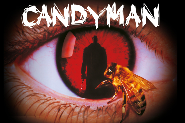 The word "Candyman" with an eyeball with a red iris, the sillhouette of a man reflected in it, and a bee touching the eyeball. 
