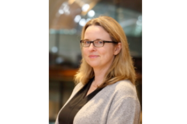 Headshot of Alison Fish, she has shoulder length blonde hair and brown glasses.