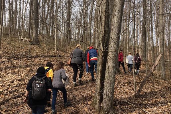 OFS Students and community partners hiking Lampblack Trail. Students and community partners hiking Lampblack Trail in Scioto County.