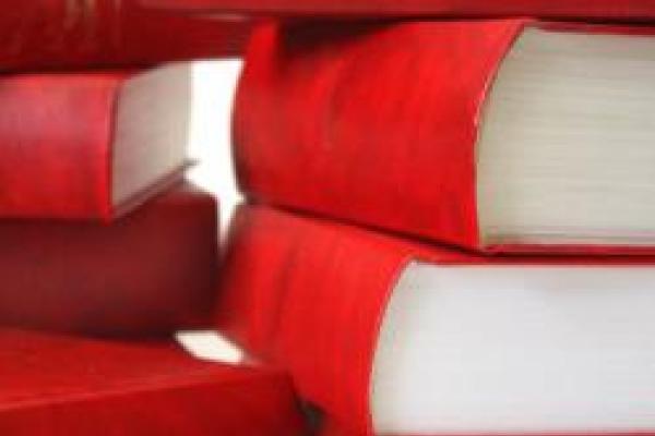 Red titleless stacked books