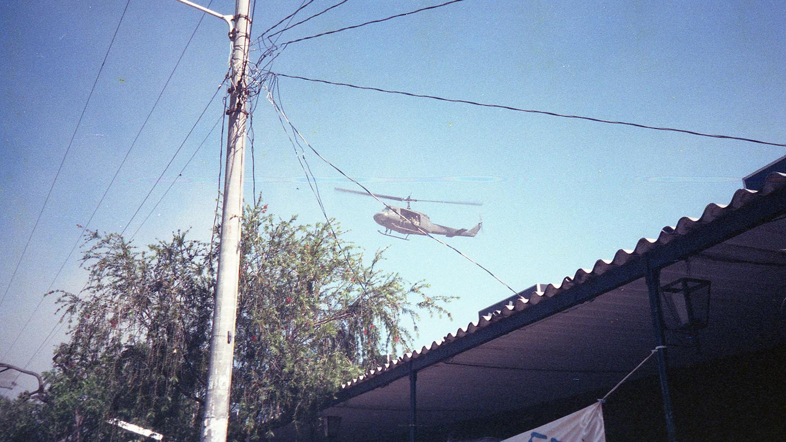 A helicopter flying over the San Salvador march