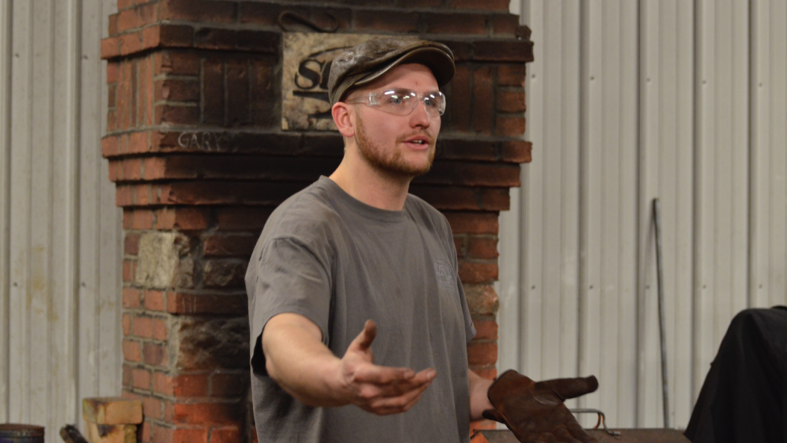 Roy Adams demonstrating blacksmith techniques