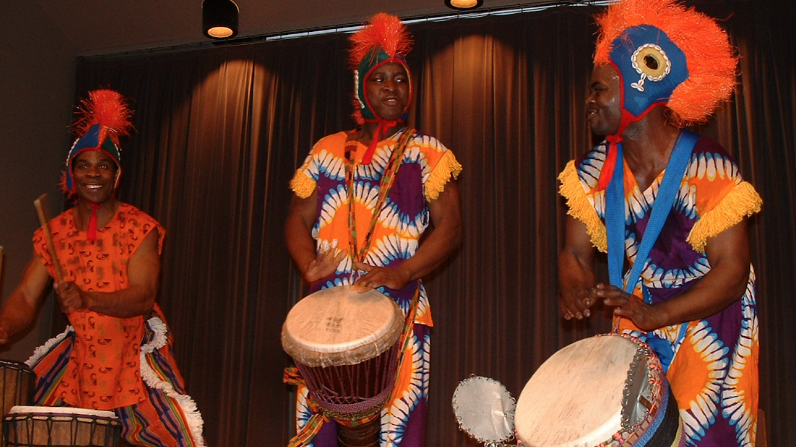 Diomande performing in traditional attire 