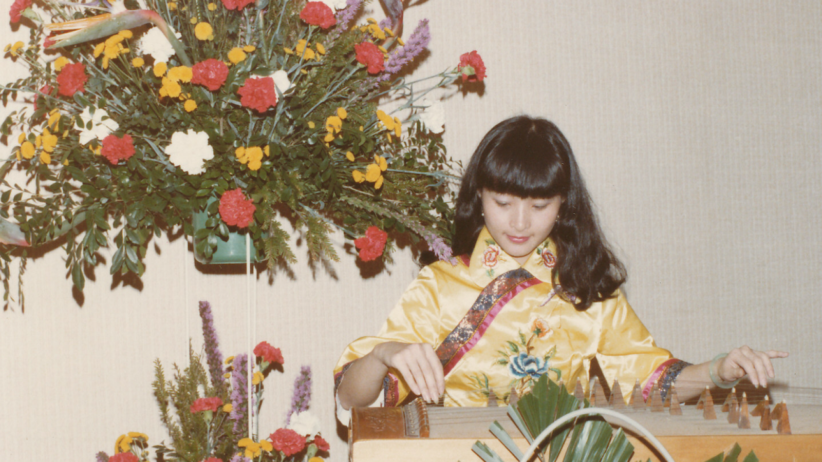 Young Lee playing guzheng 