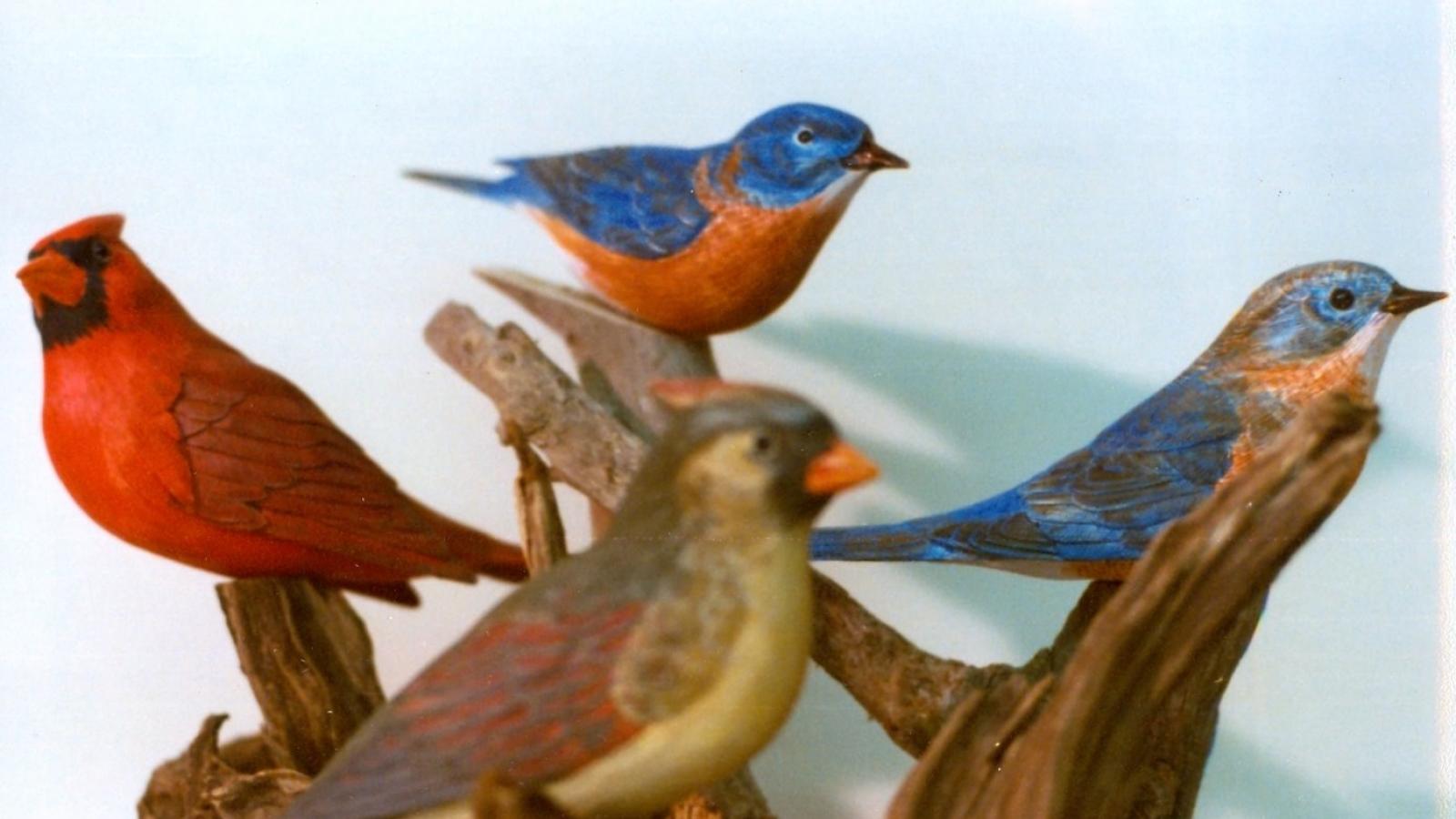Ora Anderson, male and female bluebirds and cardinals carved in wood. Athens, Ohio, 1977.