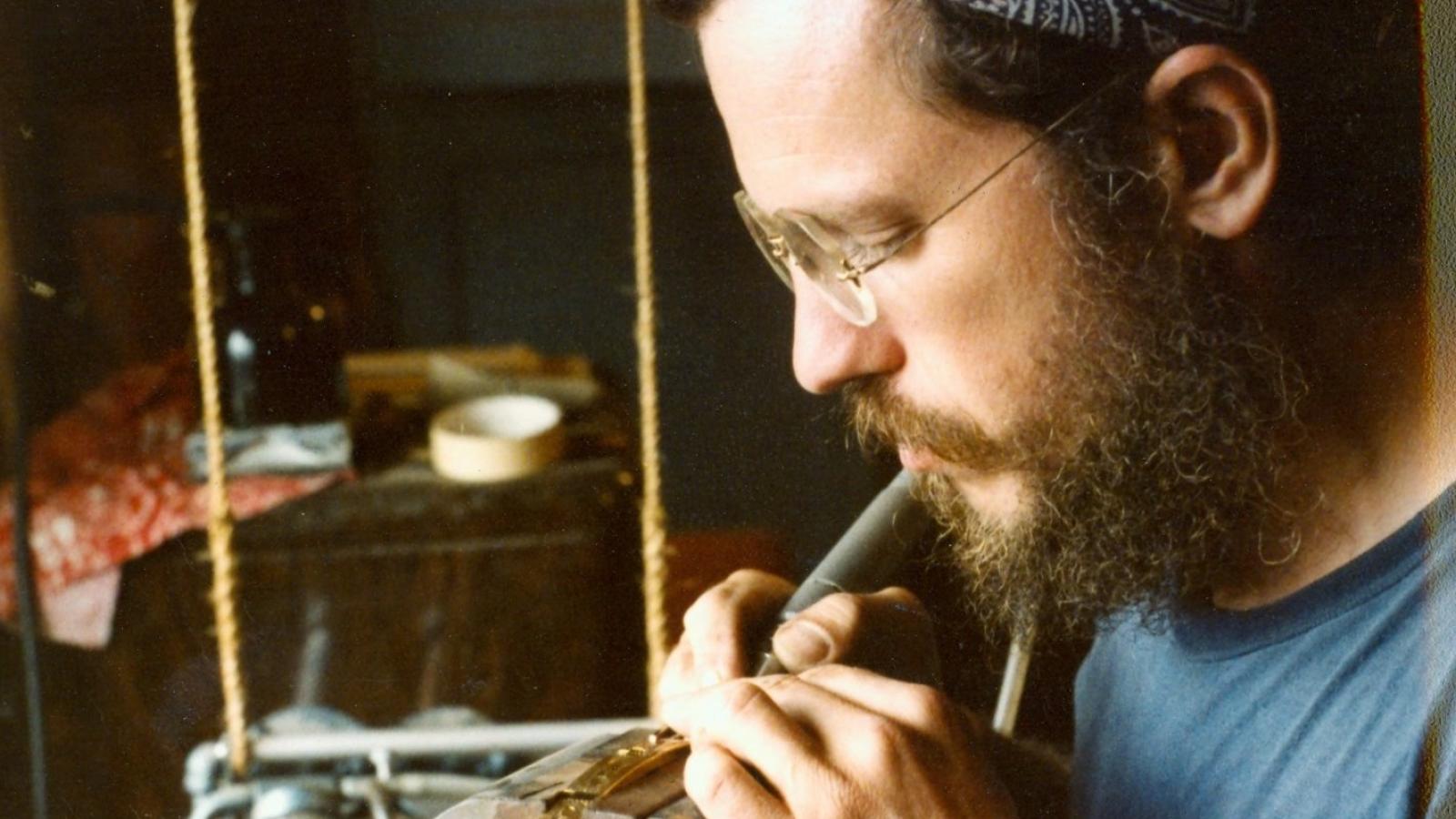 Ron Chacey engraving in his shop. Amesville, Ohio, 1977.