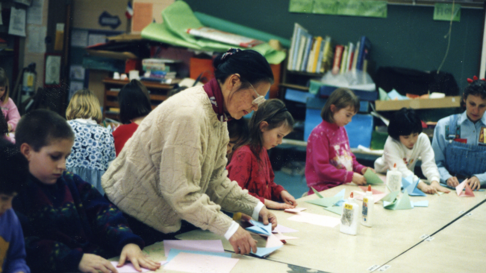 Sakaoka teaching children origami