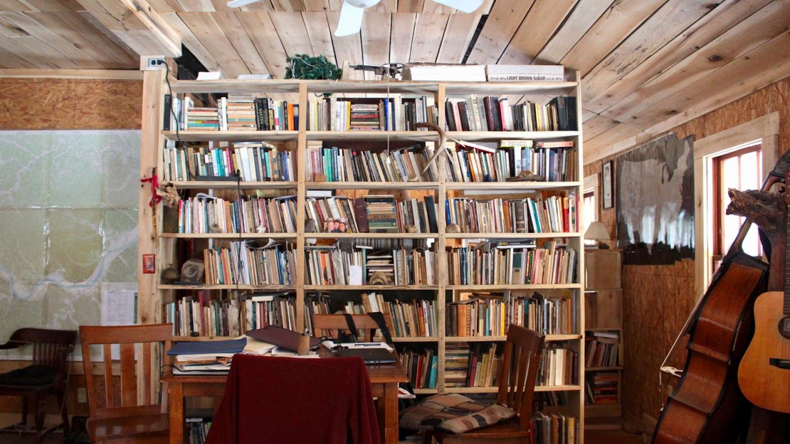 Brian Richard's handmade bookshelf in his home in Upper Twin Creek. 