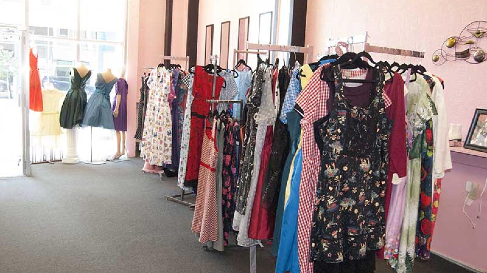 dresses on racks at the store